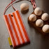 Handy Pouch knitted stripes | dolce pink & arancia orange