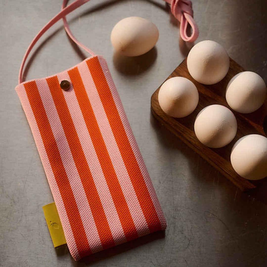 Knitted phone pouch with stripes | dolce pink & arancia orange