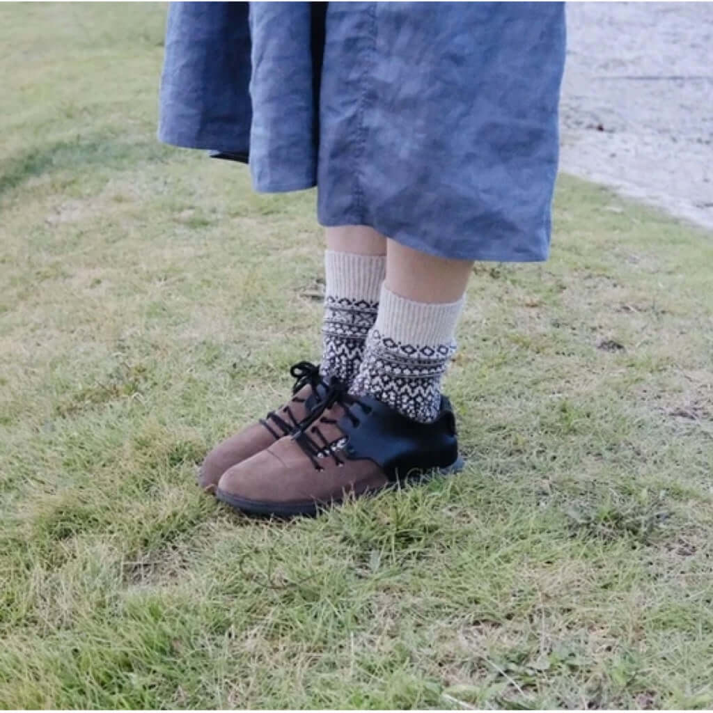 joyne.com | Woll Socken Jacquard Muster | navy & mustard von Nishiguchi Kutsushita